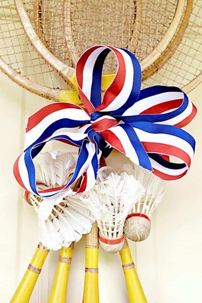 Old Badminton Racquet with Patriotic Ribbon and Vintage Birdies Wreath