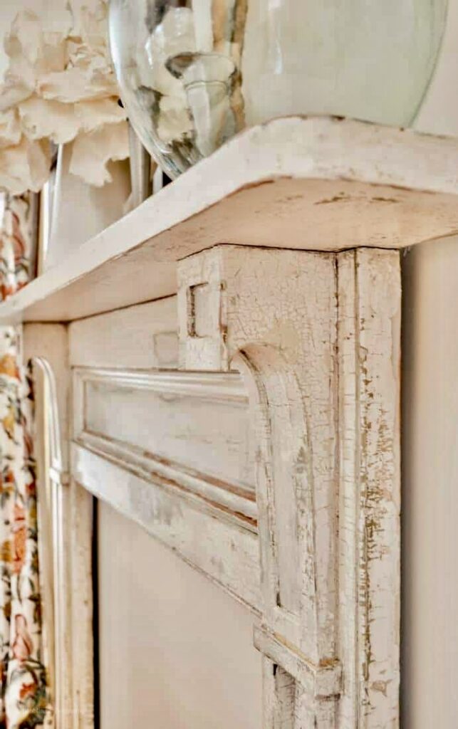 Vintage faux mantel white, attached to the wall in vintage dining room.