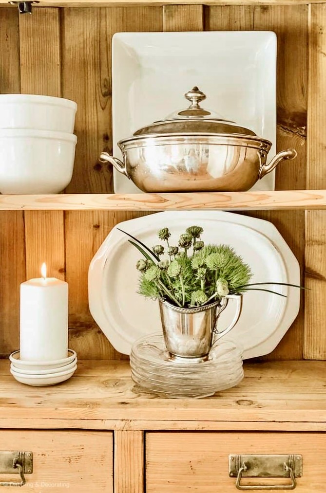 pine wood shelving with vintage decor.