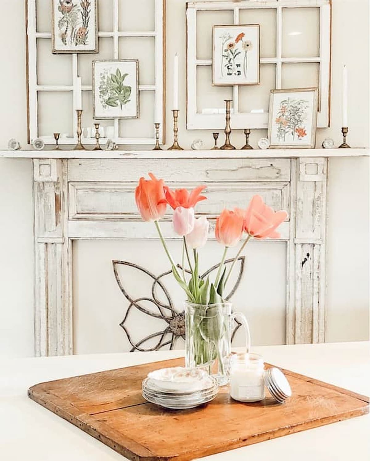 Vintage Mantel decorated for spring with framed botanicals in dining room with white farmhouse cottage style decor.