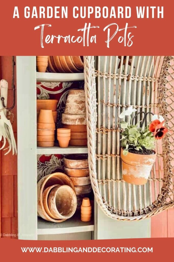 A Garden Cupboard with Terracotta Pots