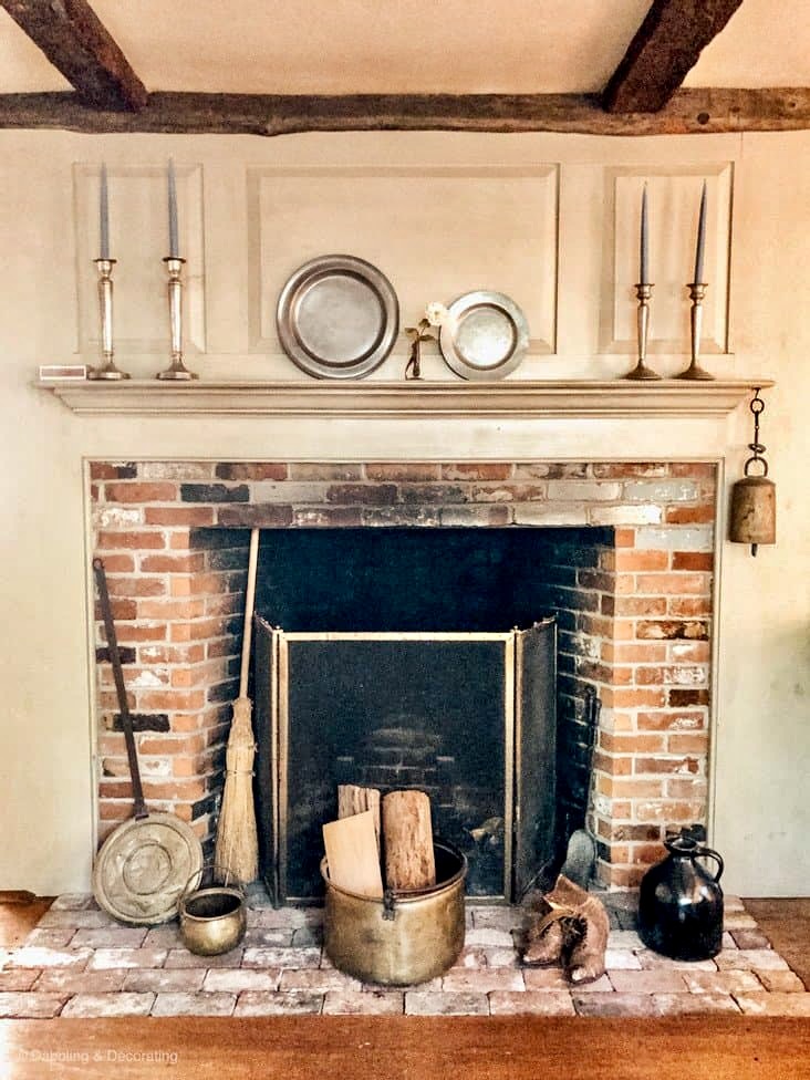 Old Fireplace inside Raeside-Dame home, signature coastal home living room.