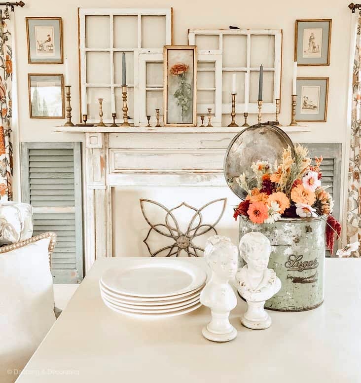 Vintage farmhouse style white dining room with vintage Sugar tin in green with seasonal florals.