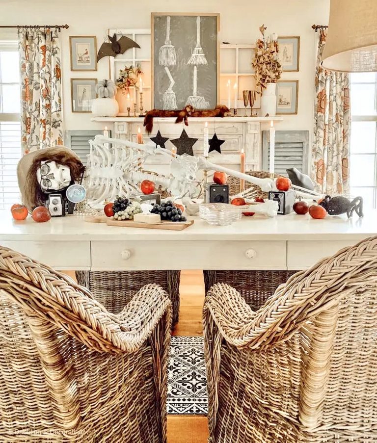 Halloween table decor with skeleton centerpiece dressed up for a party.