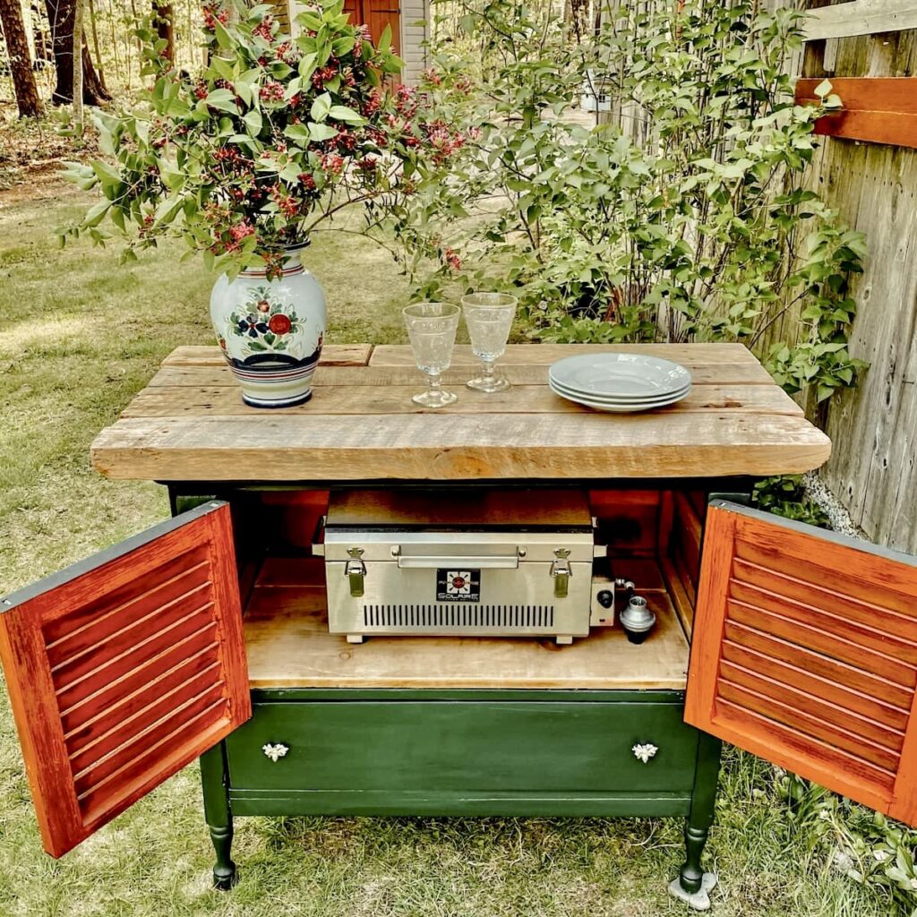 DIY grill station made out of an old dresser and shutters painted and restored for outdoor summer use.