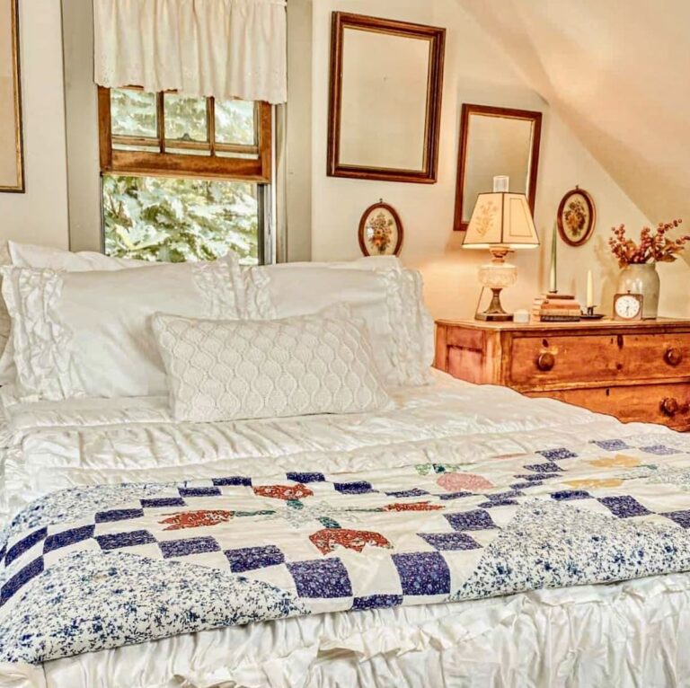 Beddy's white zipper bedding on bed in vintage small bedroom with quilt and wooden dresser.