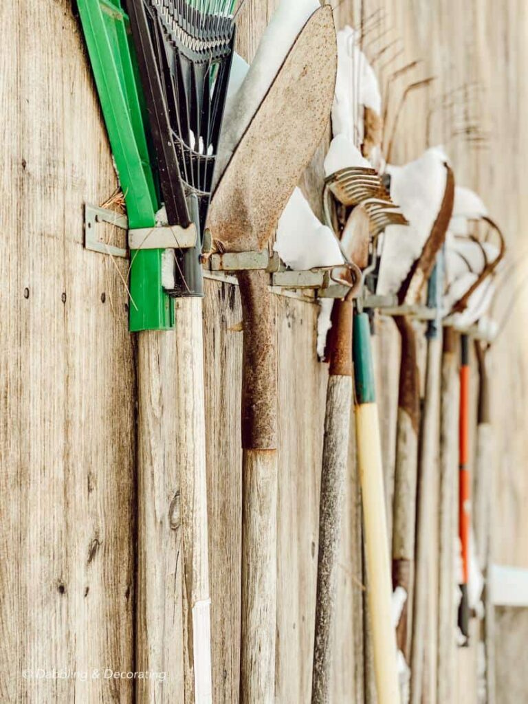 Vintage Tools Hanging in the Snow at a cottage in Maine