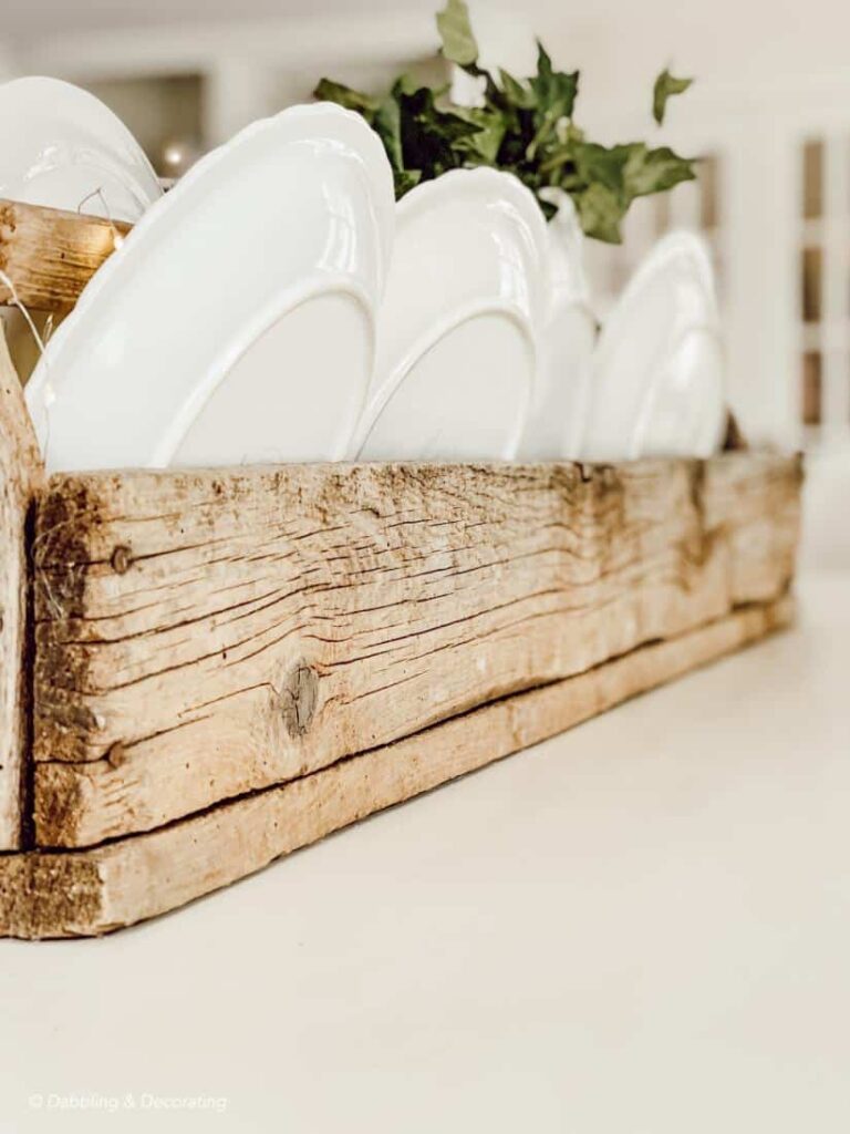 Wooden toolbox on white farmhouse table as centerpiece