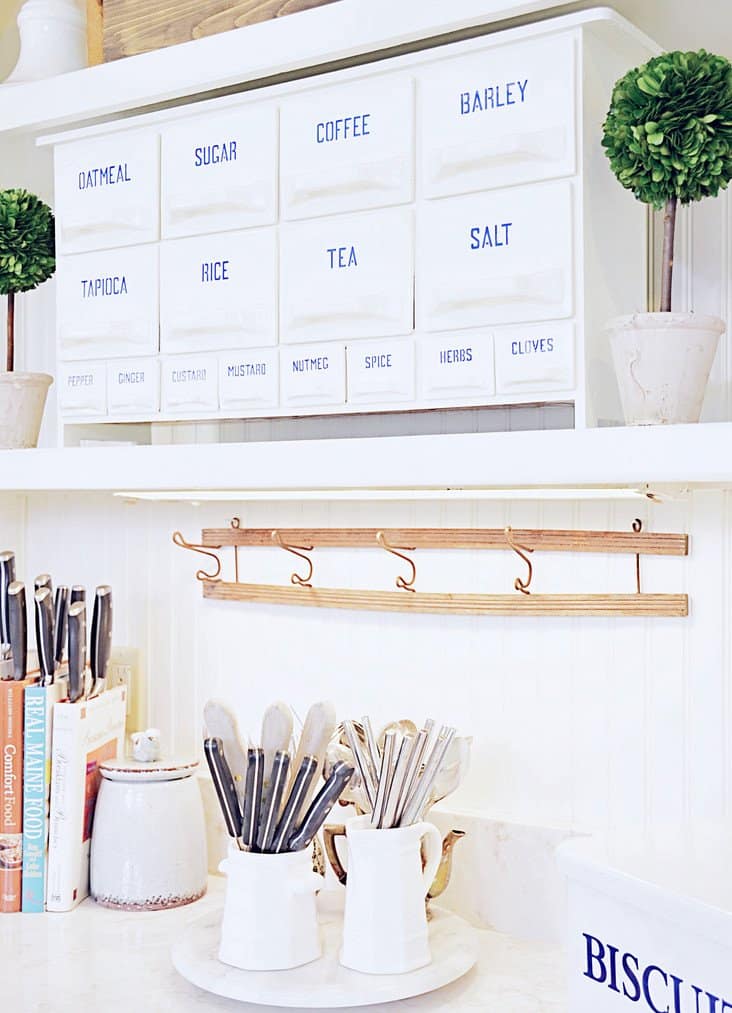 Vintage porcelan spice rack in the kitchen.