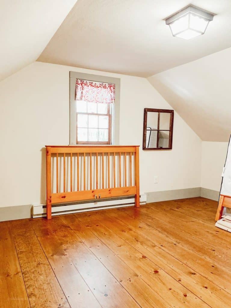 Room in Attic Truss empty with one bed headboard