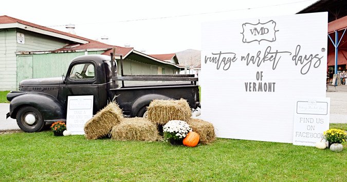 Vintage black truck with Vintage Market Days Welcome Sign.