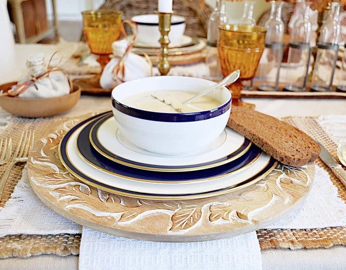 Table scape with Vermont Cheddar Cheese Soup and bread.