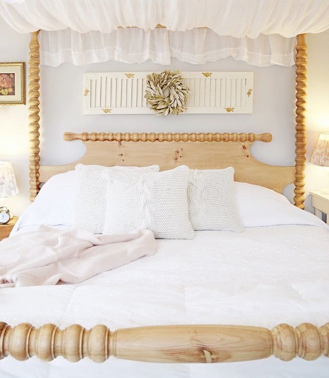 Master Bedroom with Canopy Bed and Vintage Shutter.