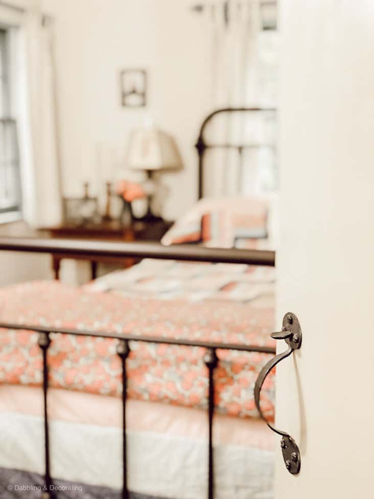 Guest bedroom entryway with latched door.