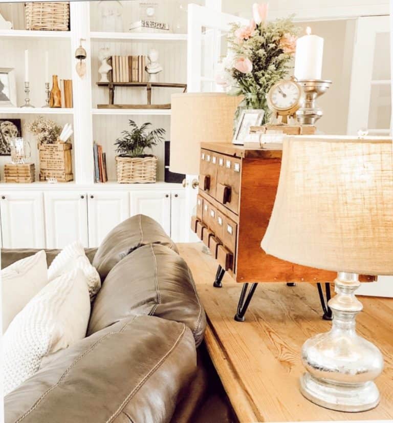 A living room filled with furniture and a large window