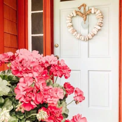 Nordic Blue Front Door on a Rustic Red House