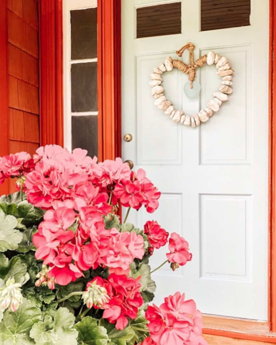 Nordic Blue Front Door on a Rustic Red House