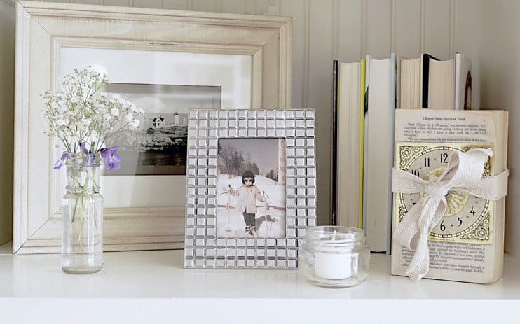 Shelfie with vintage photos and books.