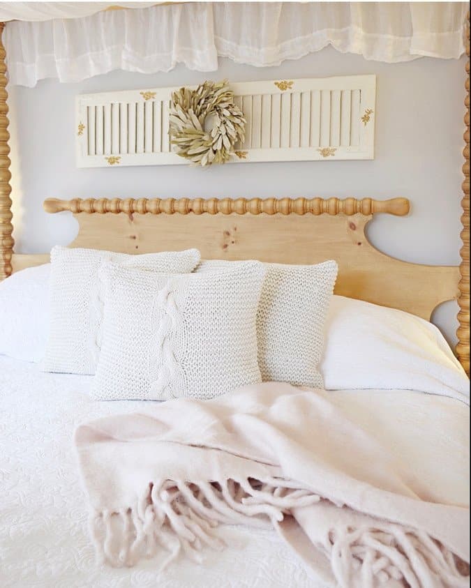 Master Bedroom with Canopy Bed and Vintage Shutter