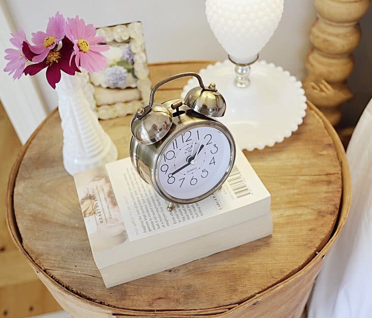 bedside table with clock