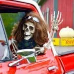 Skeleton in a red truck