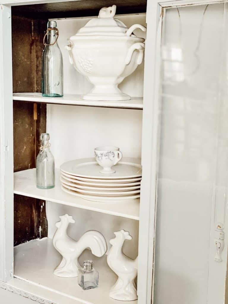 hutch with white decorations