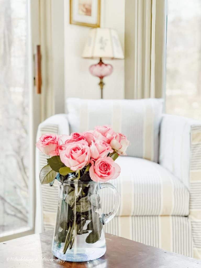 A vase filled with flowers sitting on a table