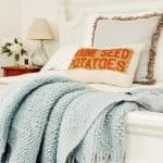 A made bed in a room