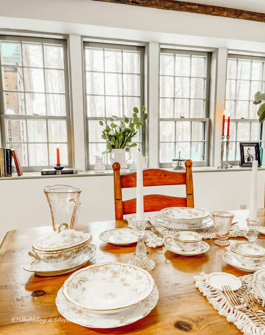 dining room table and windowsill decor in dining room.