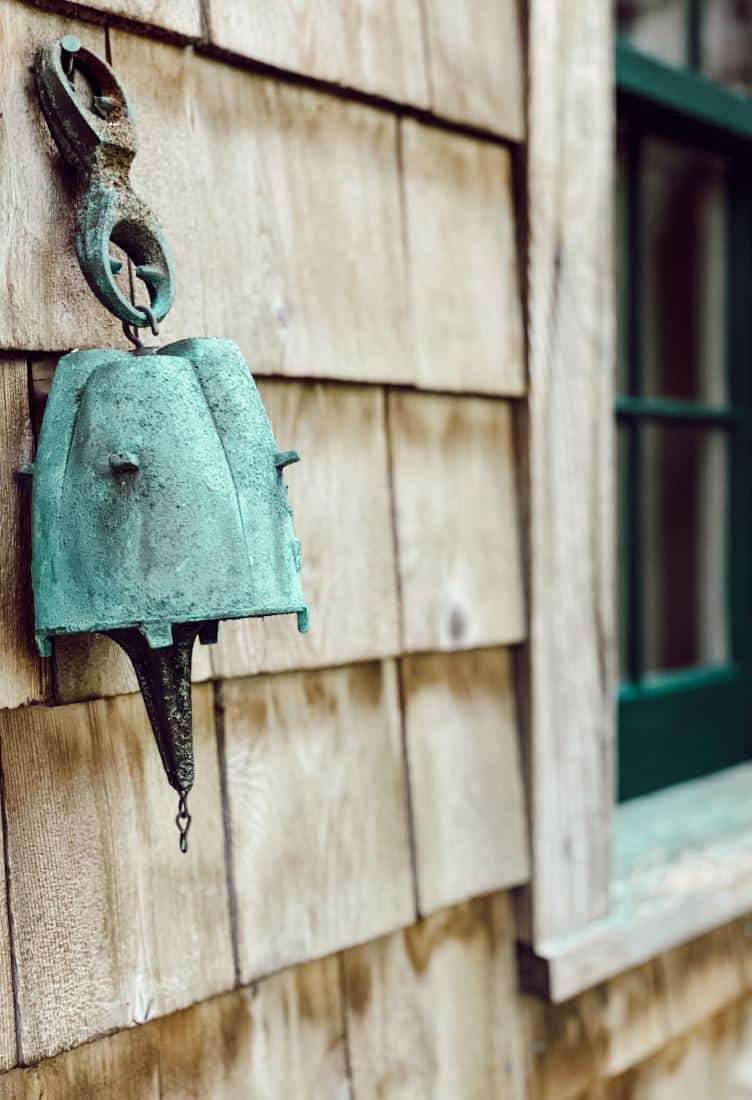 Weathered Cedar Shake Siding on Coastal Home with Essex Green Trim.