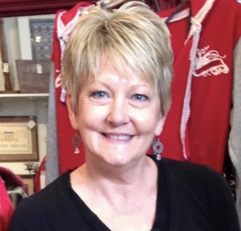 A woman smiling for the camera