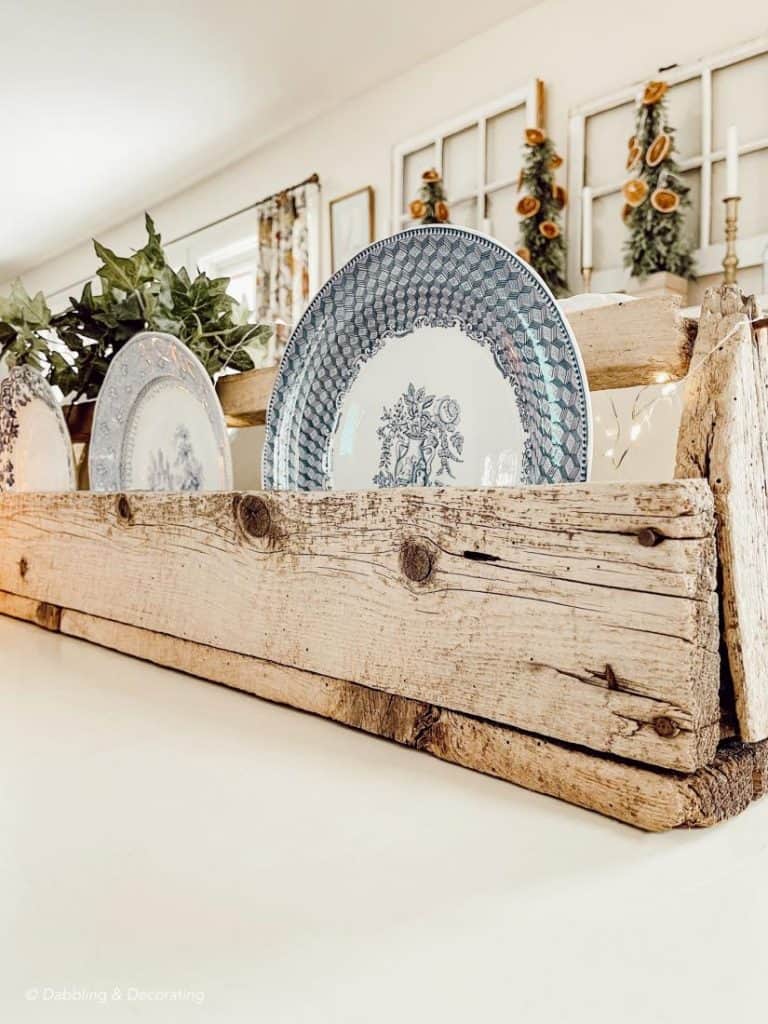 A wooden toolbox with plates