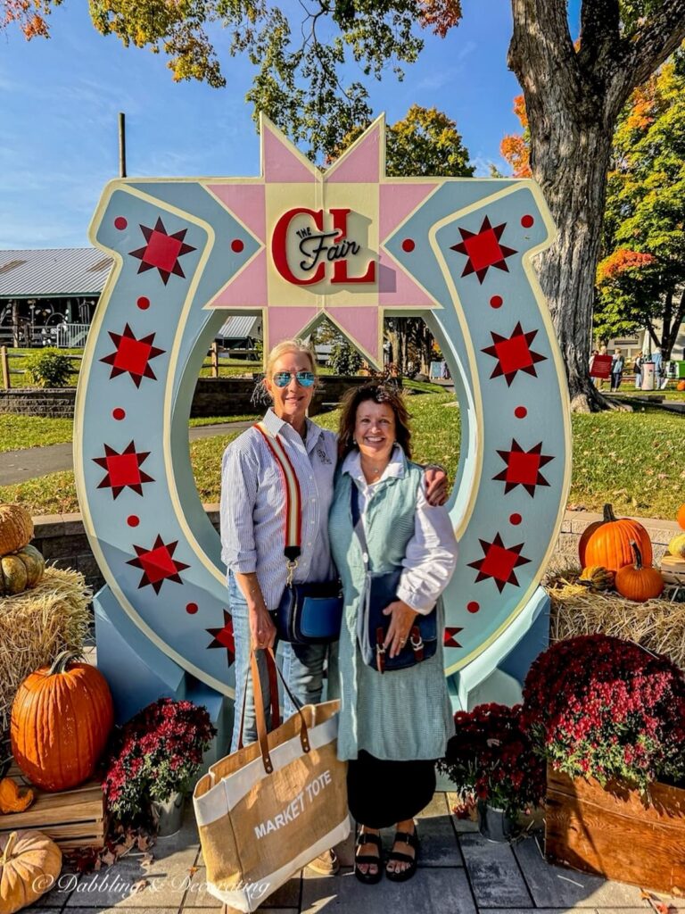 Ann and Bernadette in front of the Country Living Fair sign in Rhinebeck, NY 2026.