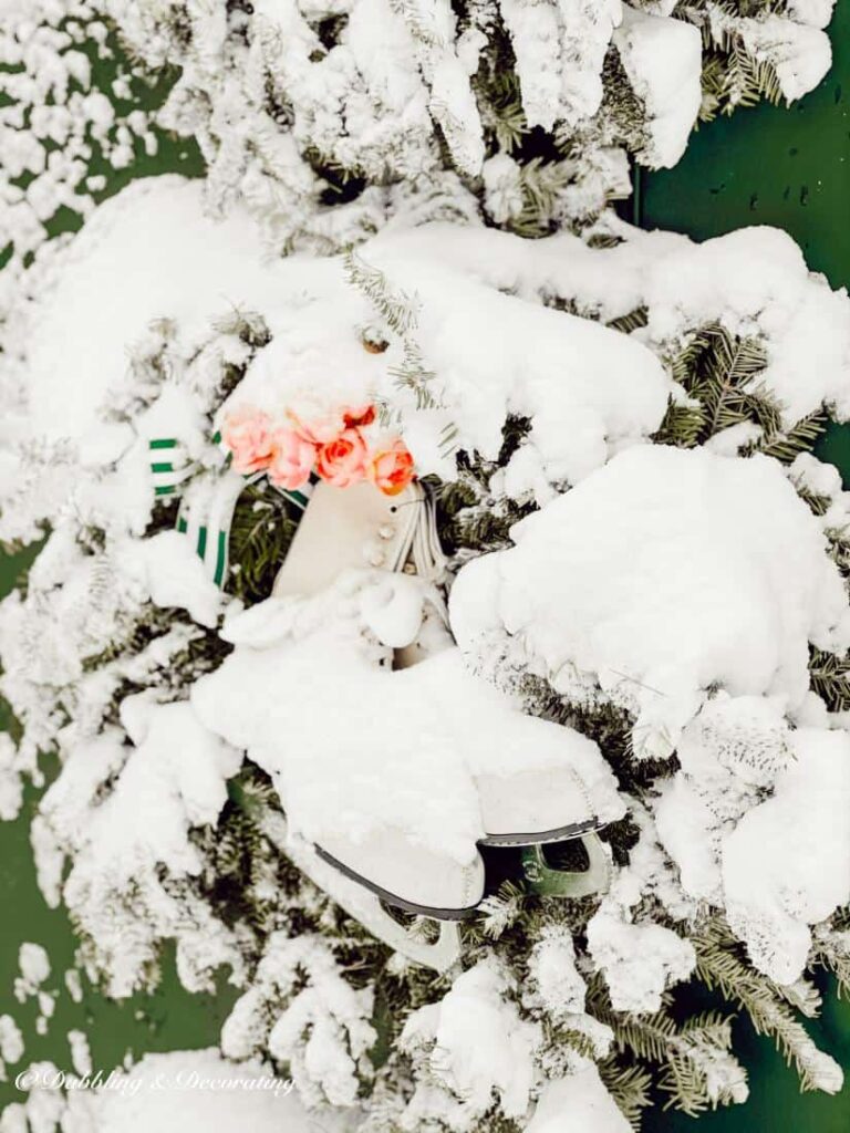 Valentine's Day Wreath with Ice Skates covered in snow.