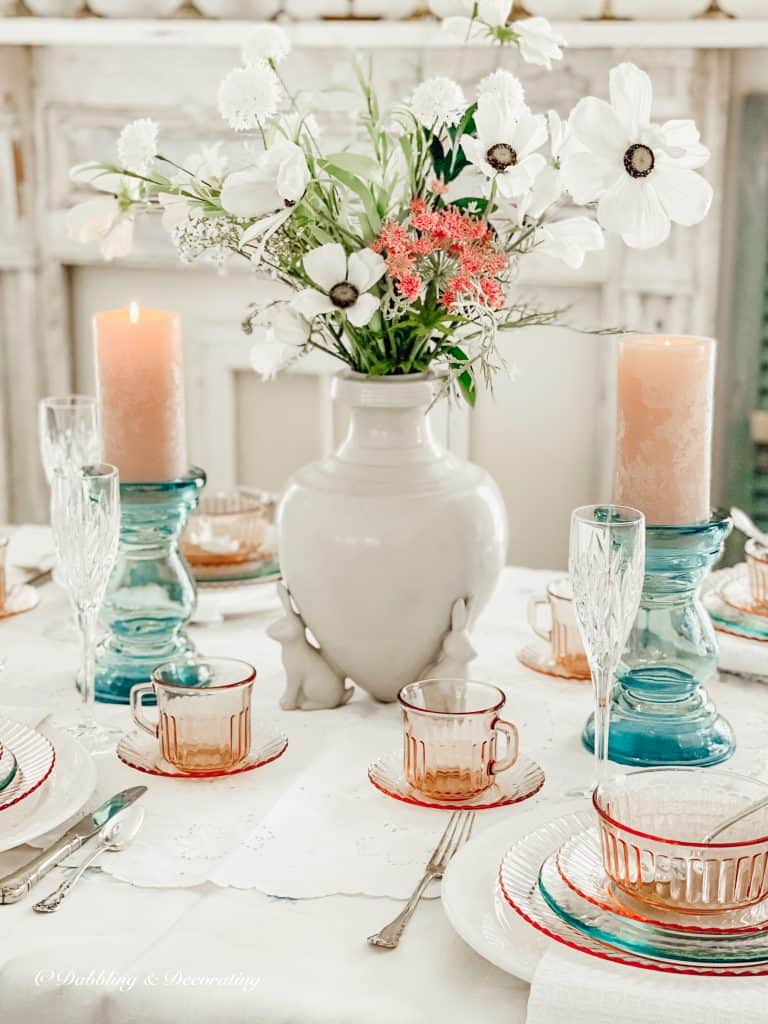 Depression Glass Cherry Blossom table setting and crock bunny centerpiece.