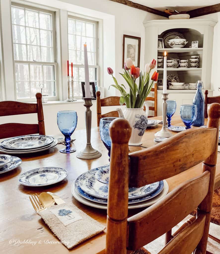 Blue and white antique table setting with tulips