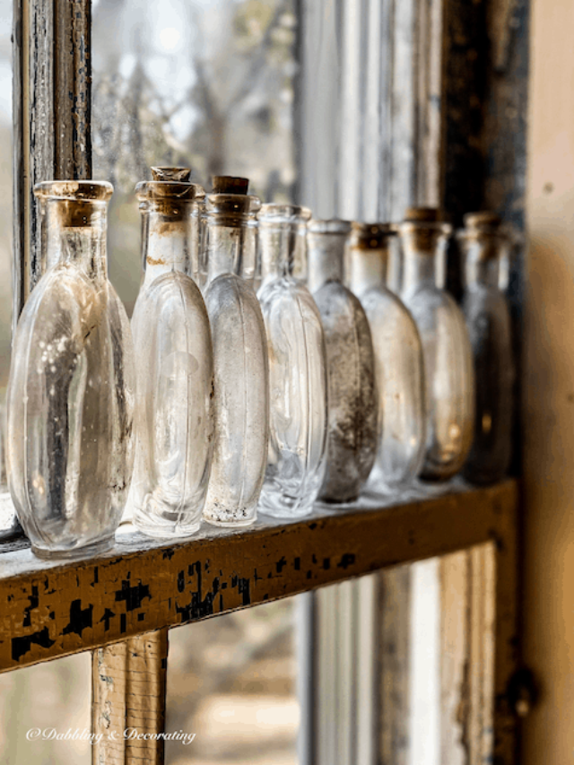 Antique Bottles, vintage decor ideas that make you smile on windowsill.