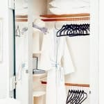 closet with bathrobe and hangers