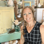 A woman standing in a kitchen