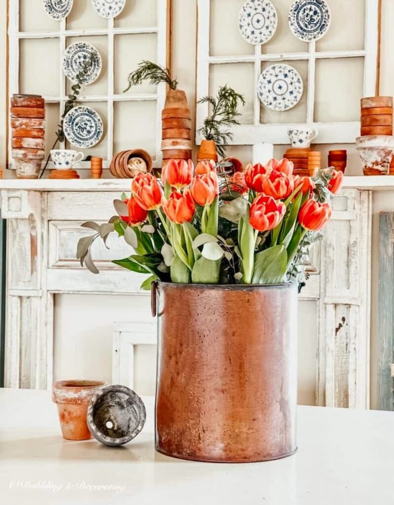 Orange Tulip Table Centerpiece, Vintage Mantel with Terracotta Pots.