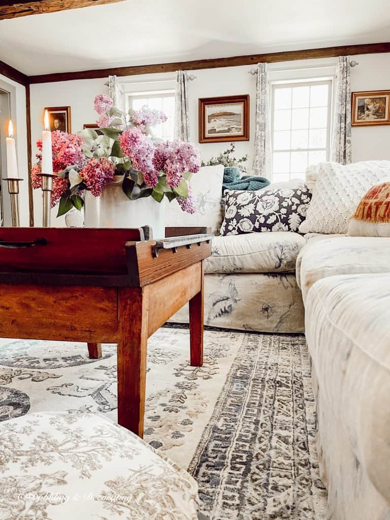 Living room coffee table with purple lilac.