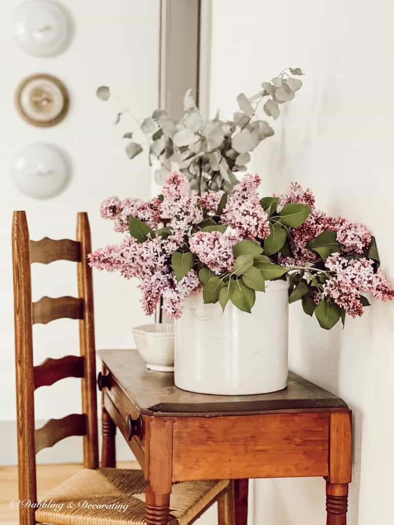 Lilacs on an antique table.