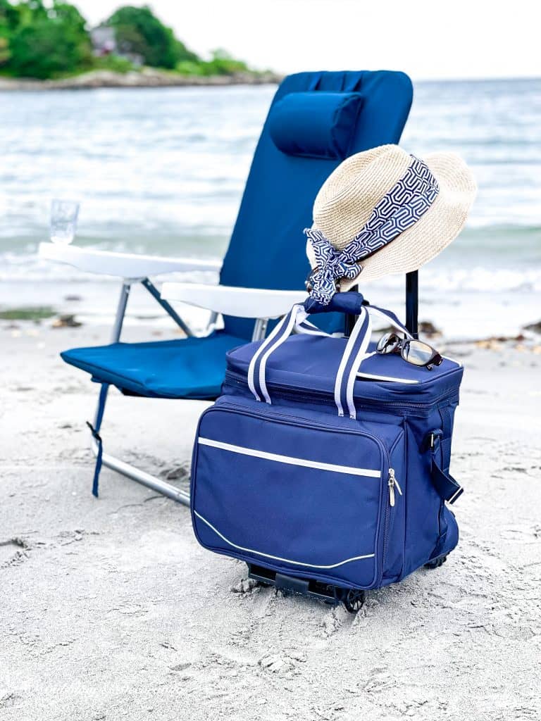 My Favorite Beach Day Essentials Beach chair and Cooler.