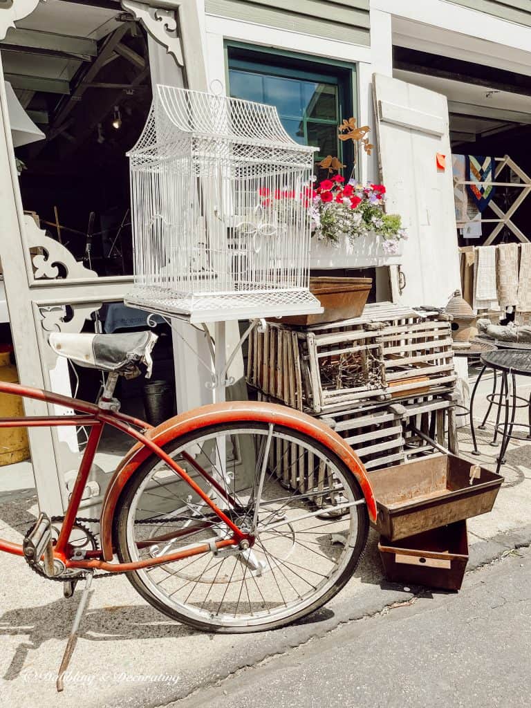 A bicycle parked on the side of a building