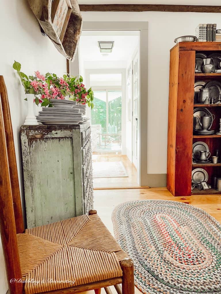 Old Fashioned Weigela Wildflower Arrangements on vintage apothecary cabinet.