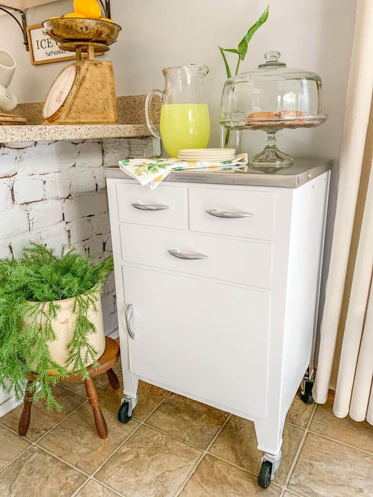 A kitchen with a stove and a sink