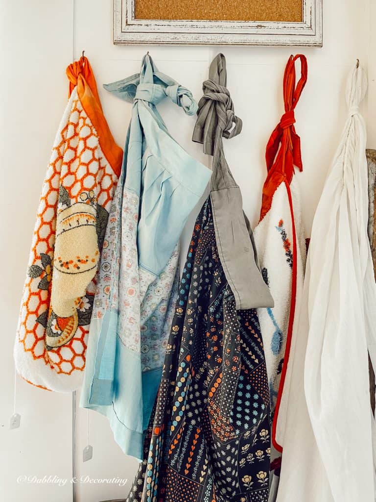 Aprons hanging on a wall