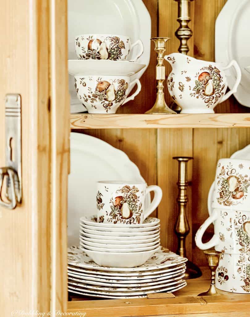 Autumn's Delight Johnson Brothers dinnerware in hutch