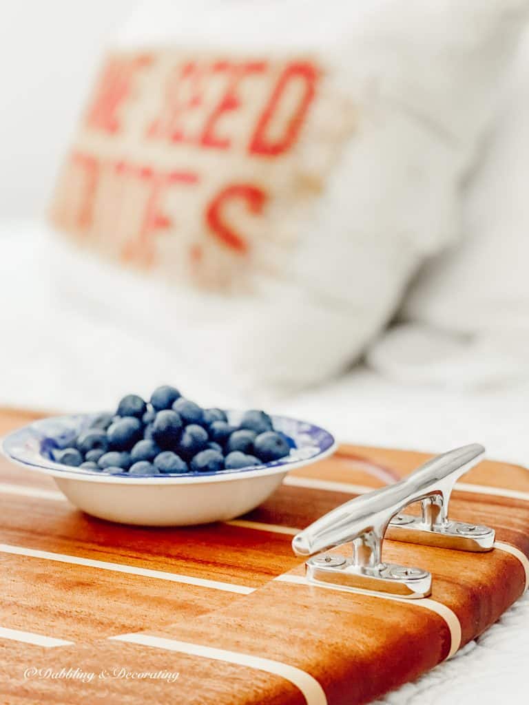 Nautical Serving Tray with Handles and bowl of blueberries.