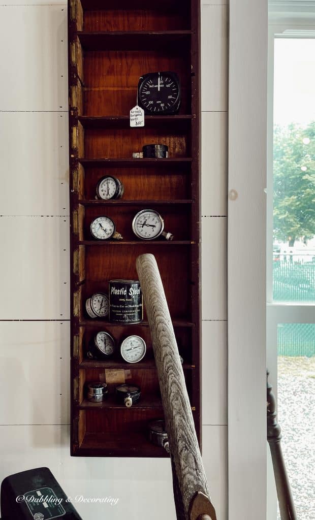 A wooden shelf sitting inside of a building